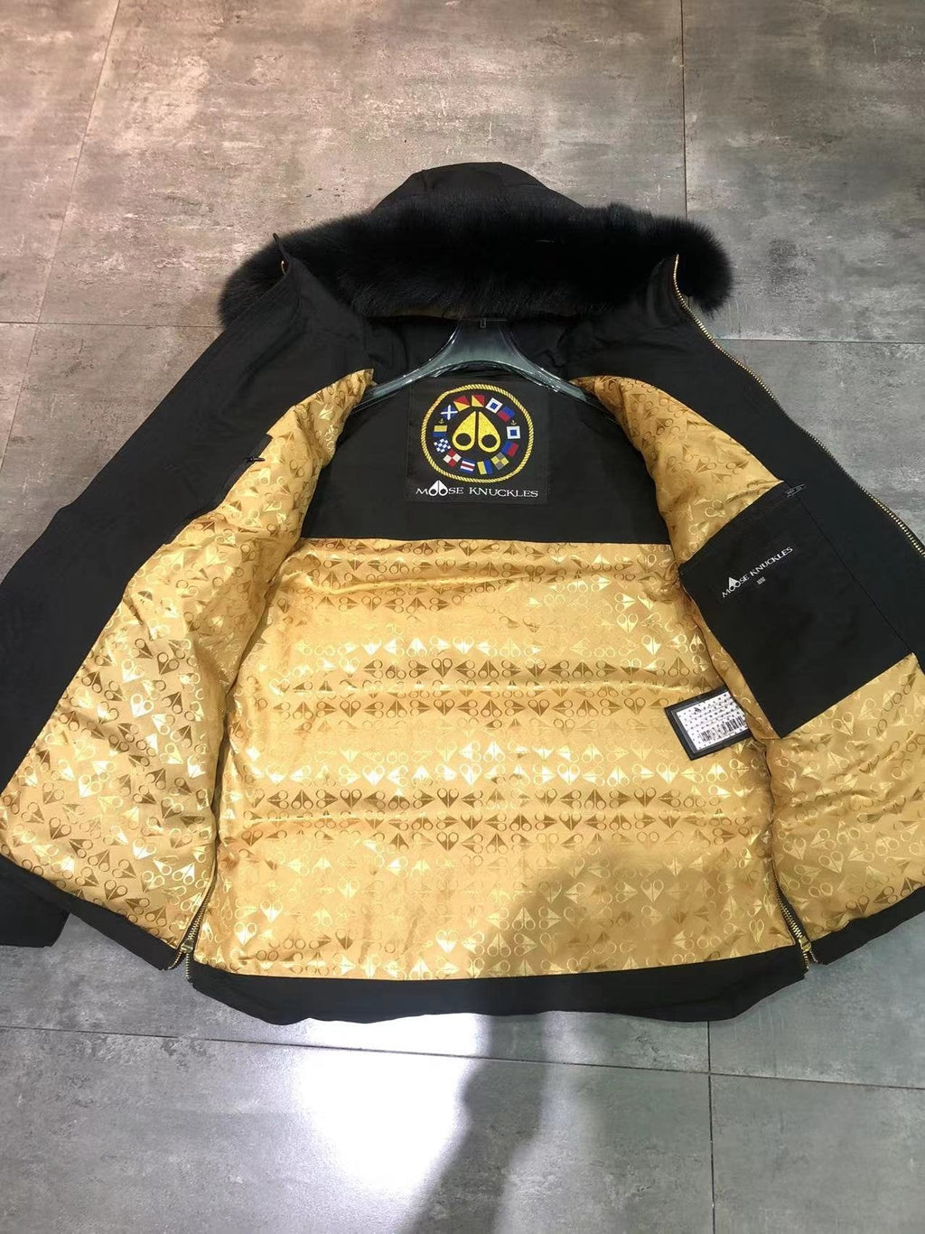 Moose Knuckles Black Hooded Puffer Jacket with Gold Lining