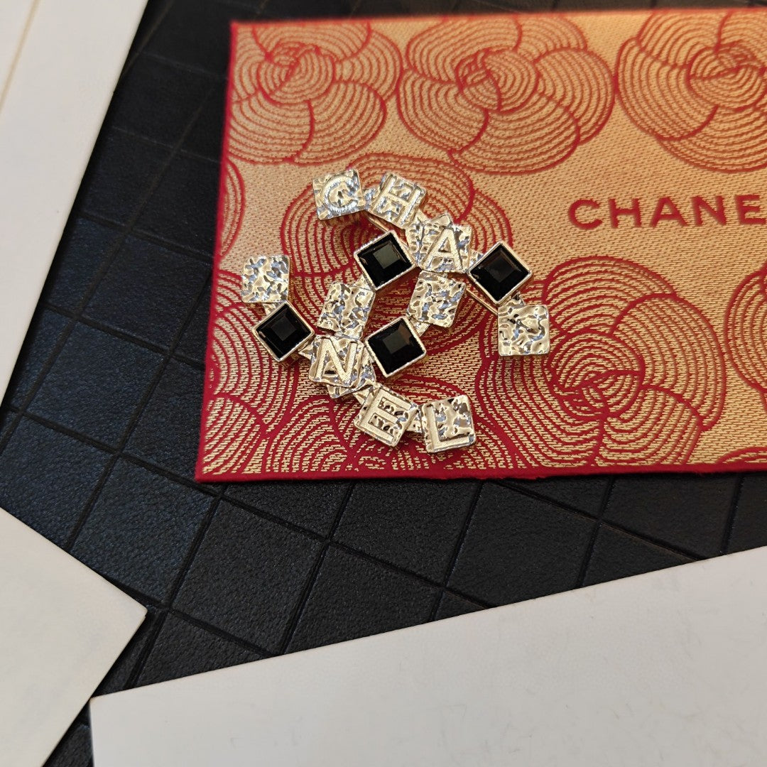 18K Chanel Black Crystals Brooch Yellow Gold-Colour Hardware