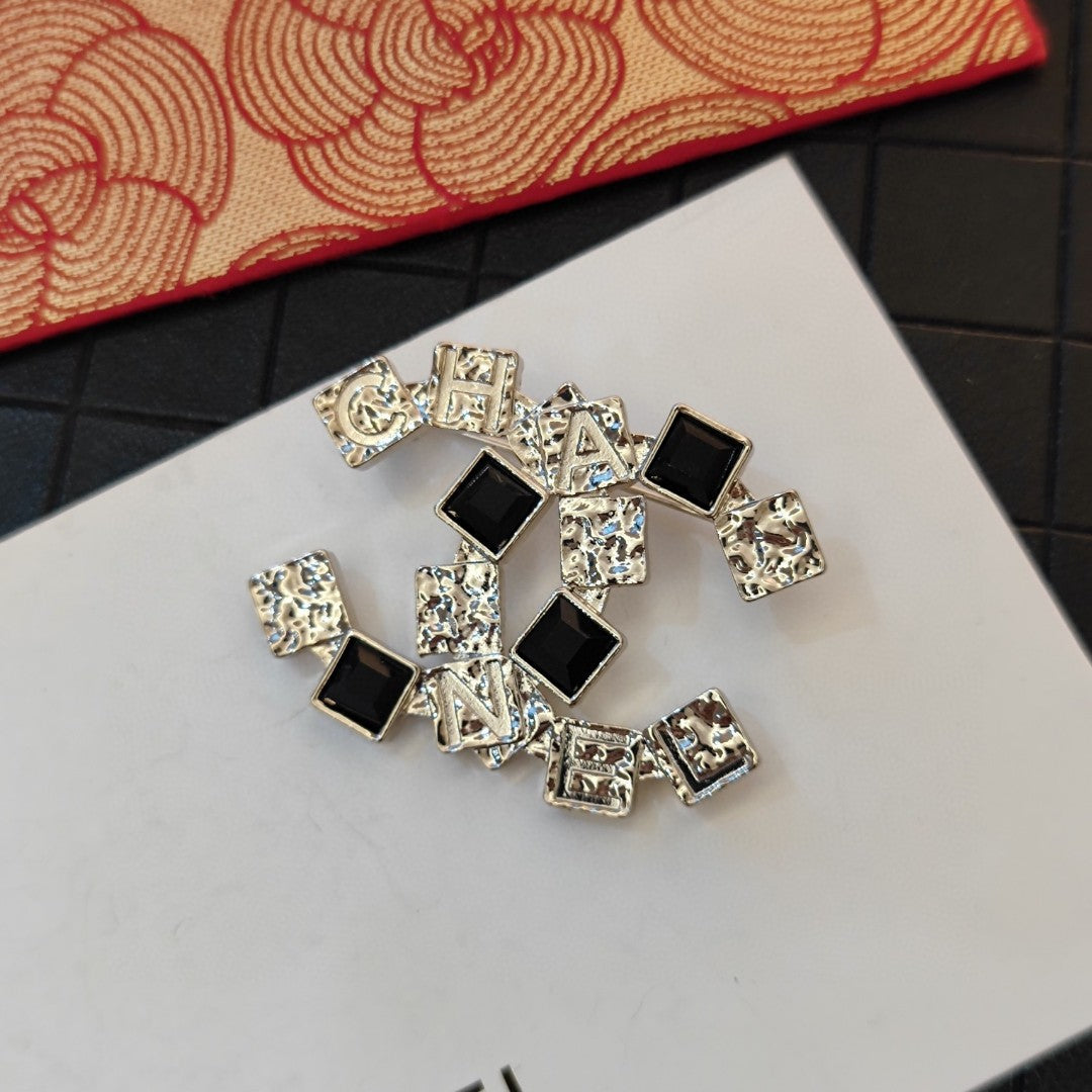 18K Chanel Black Crystals Brooch Yellow Gold-Colour Hardware