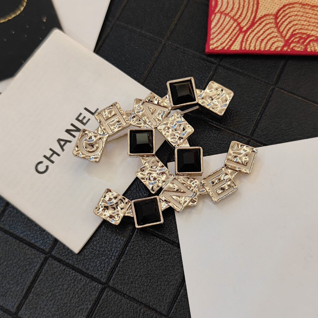 18K Chanel Black Crystals Brooch Yellow Gold-Colour Hardware