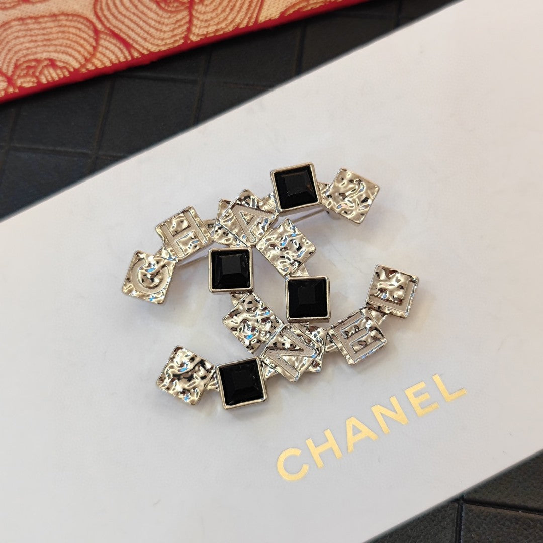 18K Chanel Black Crystals Brooch Yellow Gold-Colour Hardware